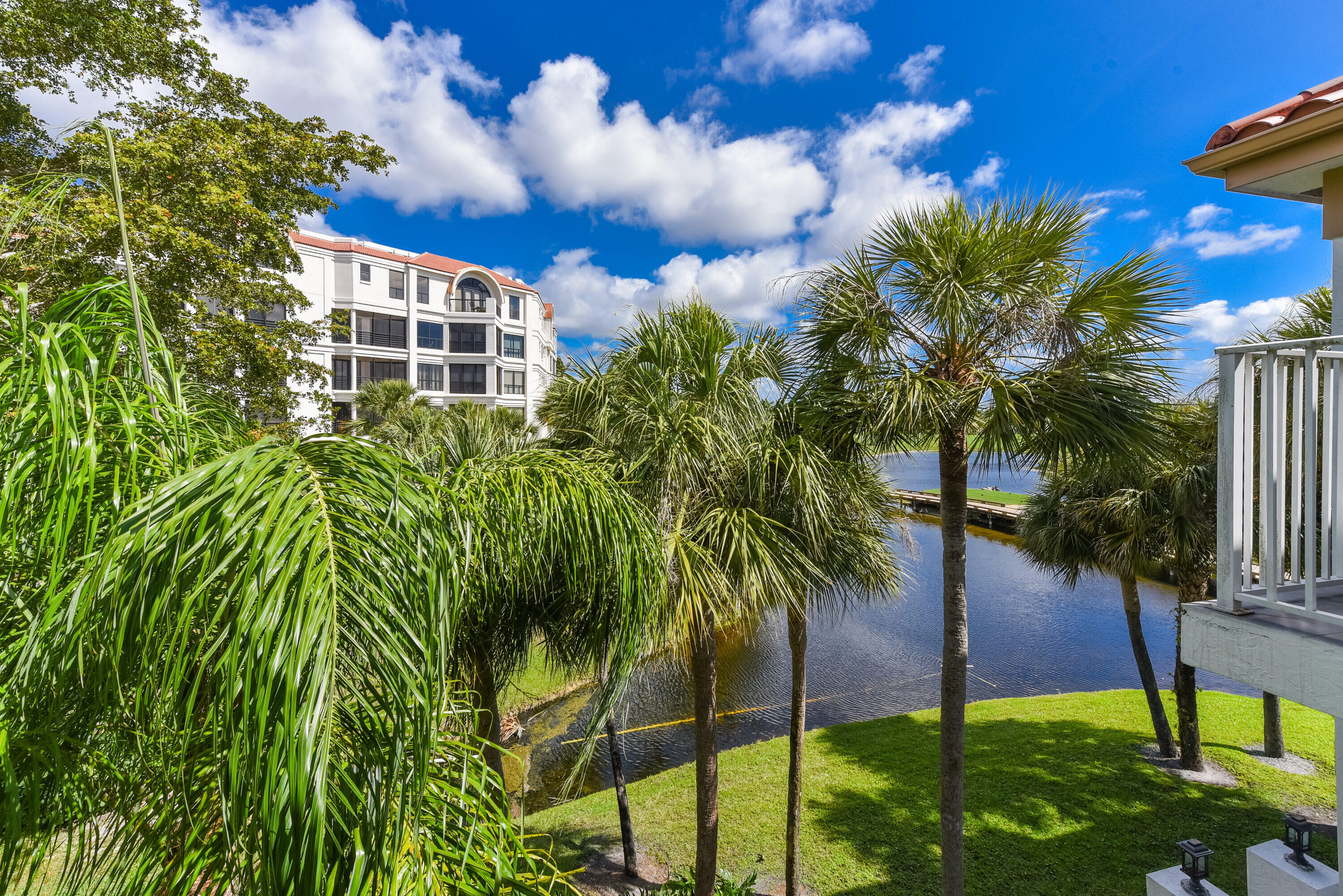 7369 Orangewood Lane, Unit 301 Boca Raton, FL 33433 - Photo 2 of 53 a view of a garden