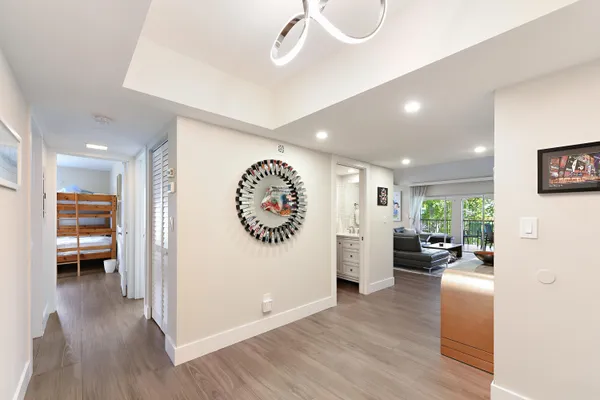 a view of a living room and a wooden floor