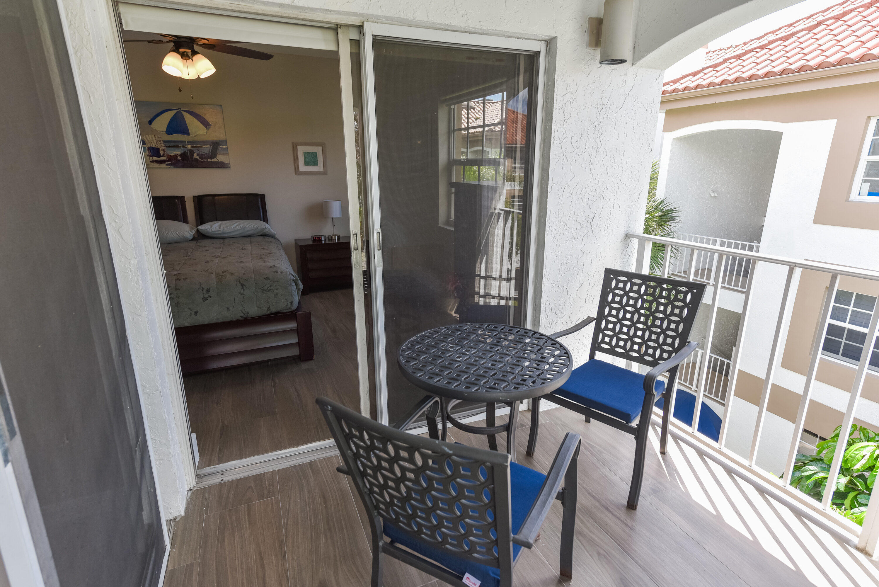 7369 Orangewood Lane, Unit 301 Boca Raton, FL 33433 - Photo 28 of 53 a view of a room with furniture and wooden floor