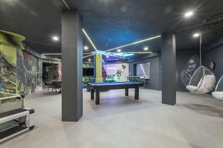 7369 Orangewood Lane, Unit 301 Boca Raton, FL 33433 - Photo 39 of 53 a view of game room with gym equipment