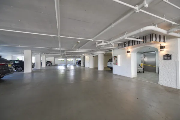 a view of a building with lots of traffic signal lights