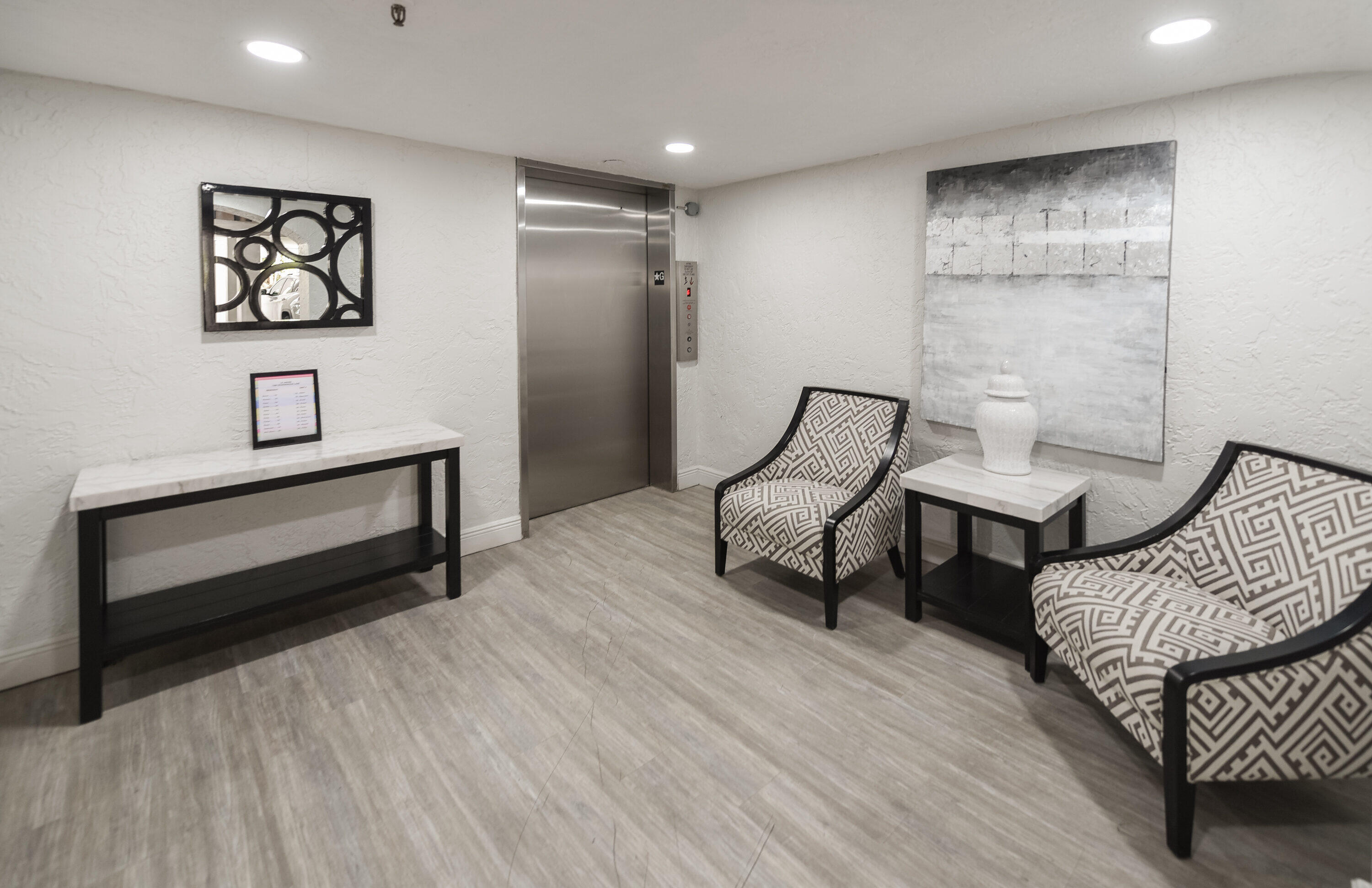 7369 Orangewood Lane, Unit 301 Boca Raton, FL 33433 - Photo 6 of 53 a living room with furniture