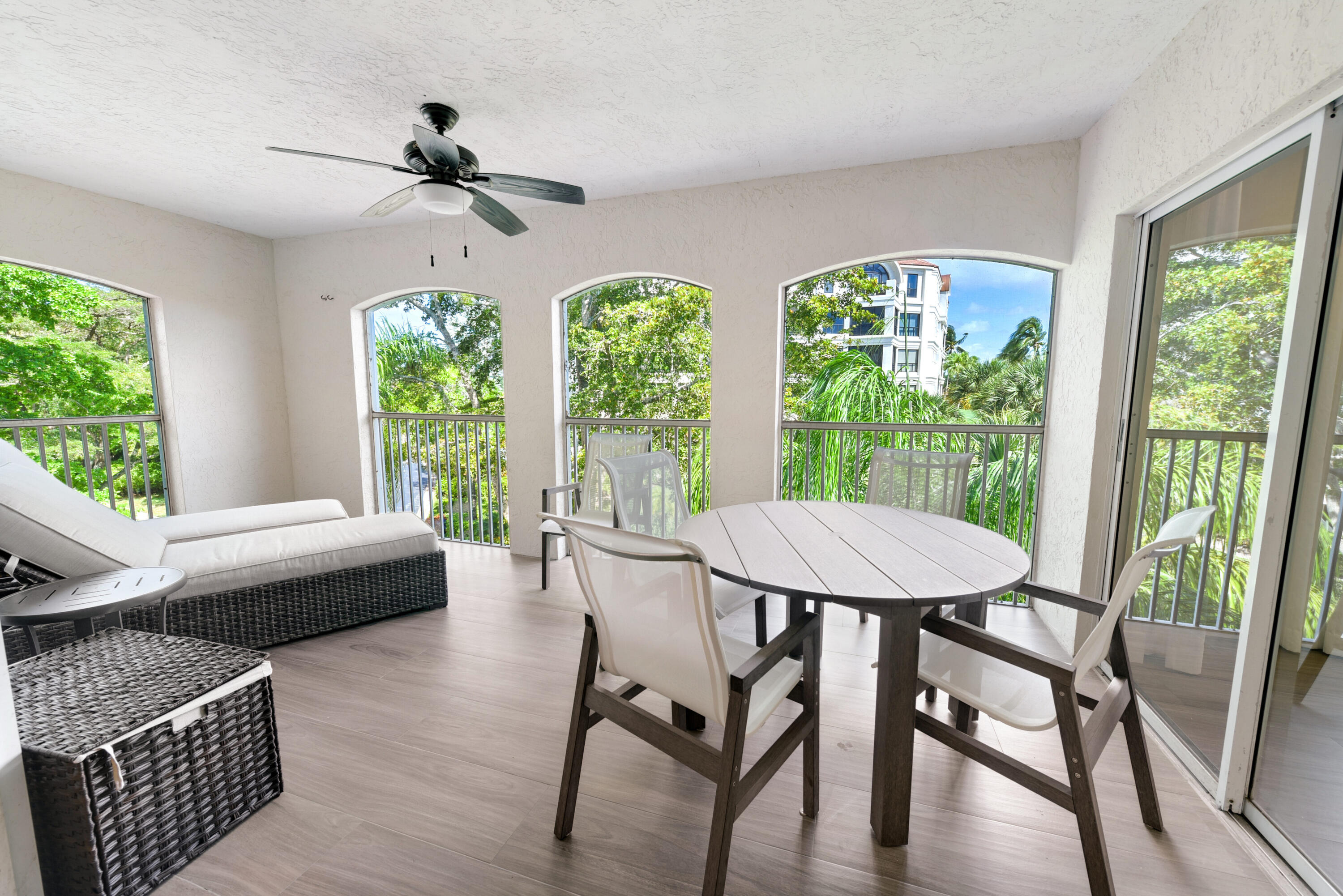 7369 Orangewood Lane, Unit 301 Boca Raton, FL 33433 - Photo 9 of 53 a view of a dining room with furniture window and outside view