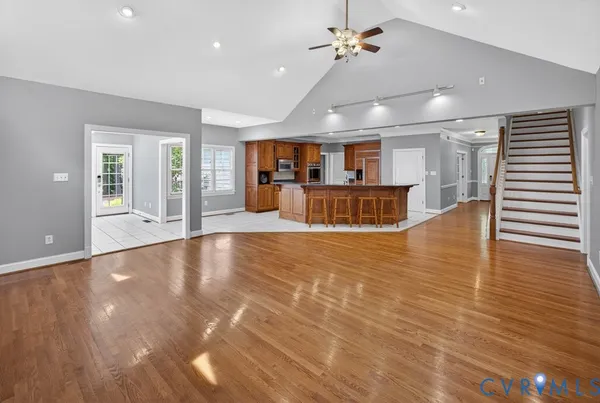 a view of a balcony with wooden floor
