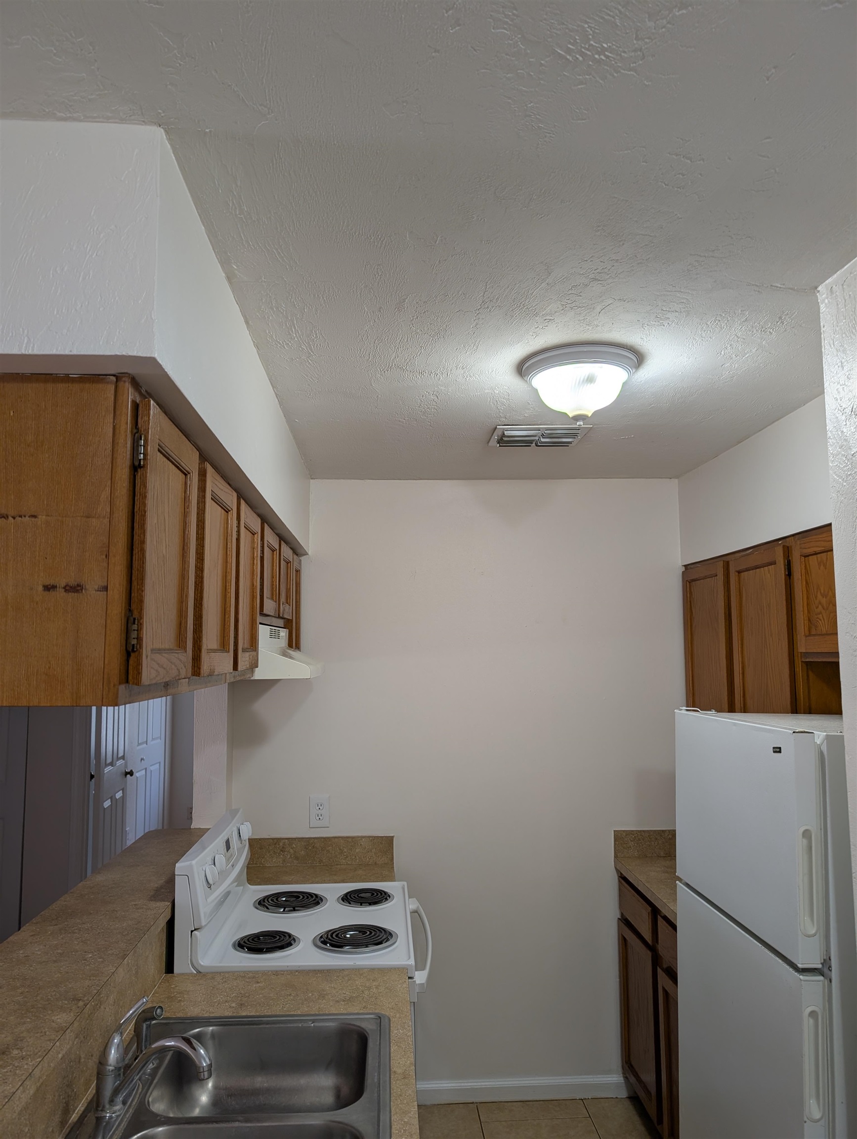 3891 Osprey Circle, Unit B St. Augustine, FL 32086 - Photo 7 of 18 a utility room with dryer and washer