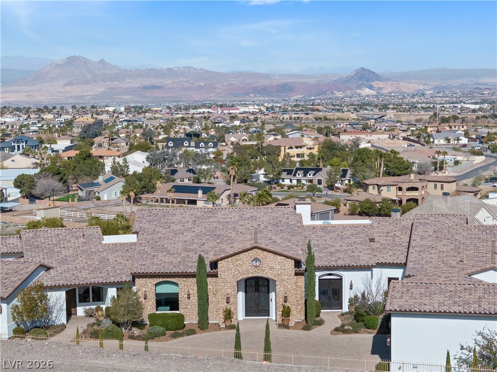 1123 Christian Road Henderson, NV 89002 - Photo 84 of 94 Perched on a hillside, this residence offers sweeping views of the valley and distant mountains.