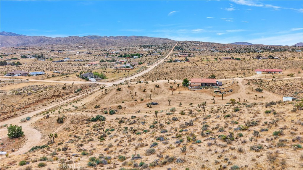24575 Ocotillo Way Apple Valley, CA 92308 - Photo 11 of 13 a view of a mountain with an outdoor space