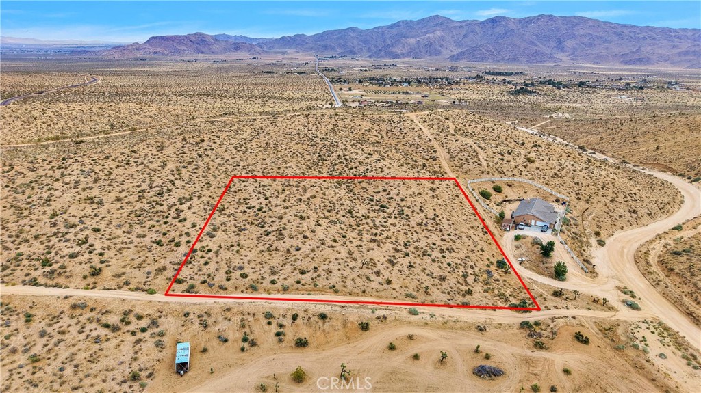 24575 Ocotillo Way Apple Valley, CA 92308 - Photo 2 of 13 a view of lake with mountain