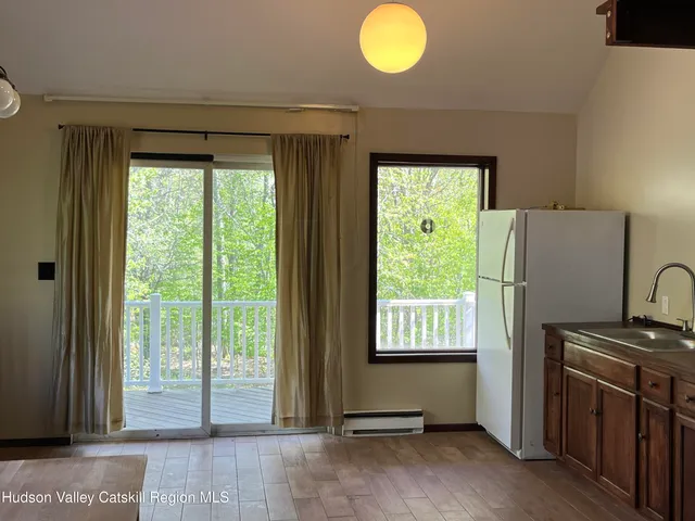 a view of staircase with a window
