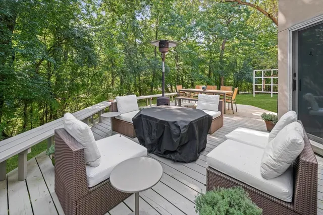 a view of a patio in the backyard