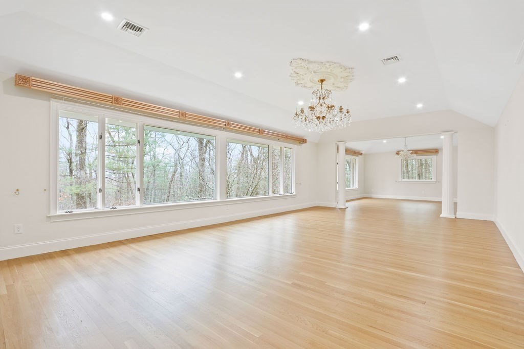 80 Doublet Hill Road Weston, MA 02493 - Photo 7 of 38 a view of empty room with wooden floor and fan