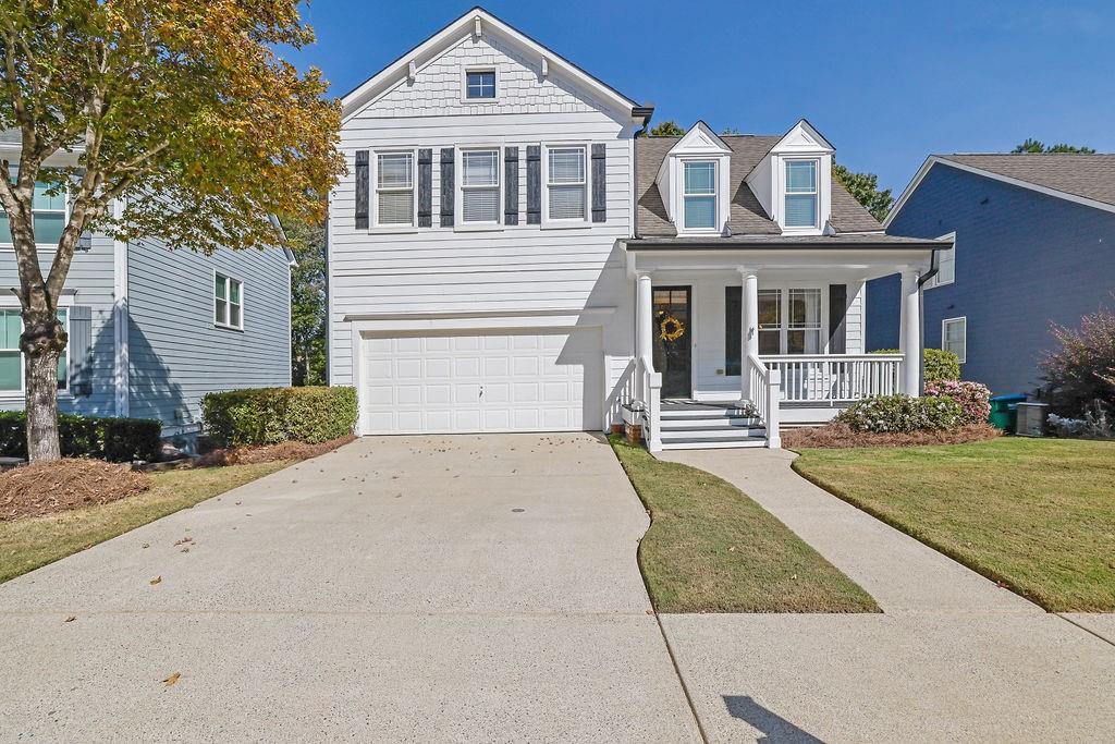 104 Market Lane Canton, GA 30114 - Photo 1 of 1 front view of a house with a yard