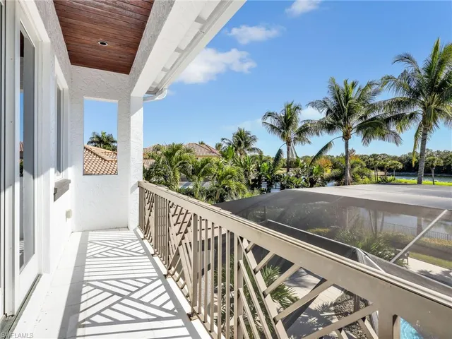 a view of balcony with wooden floor