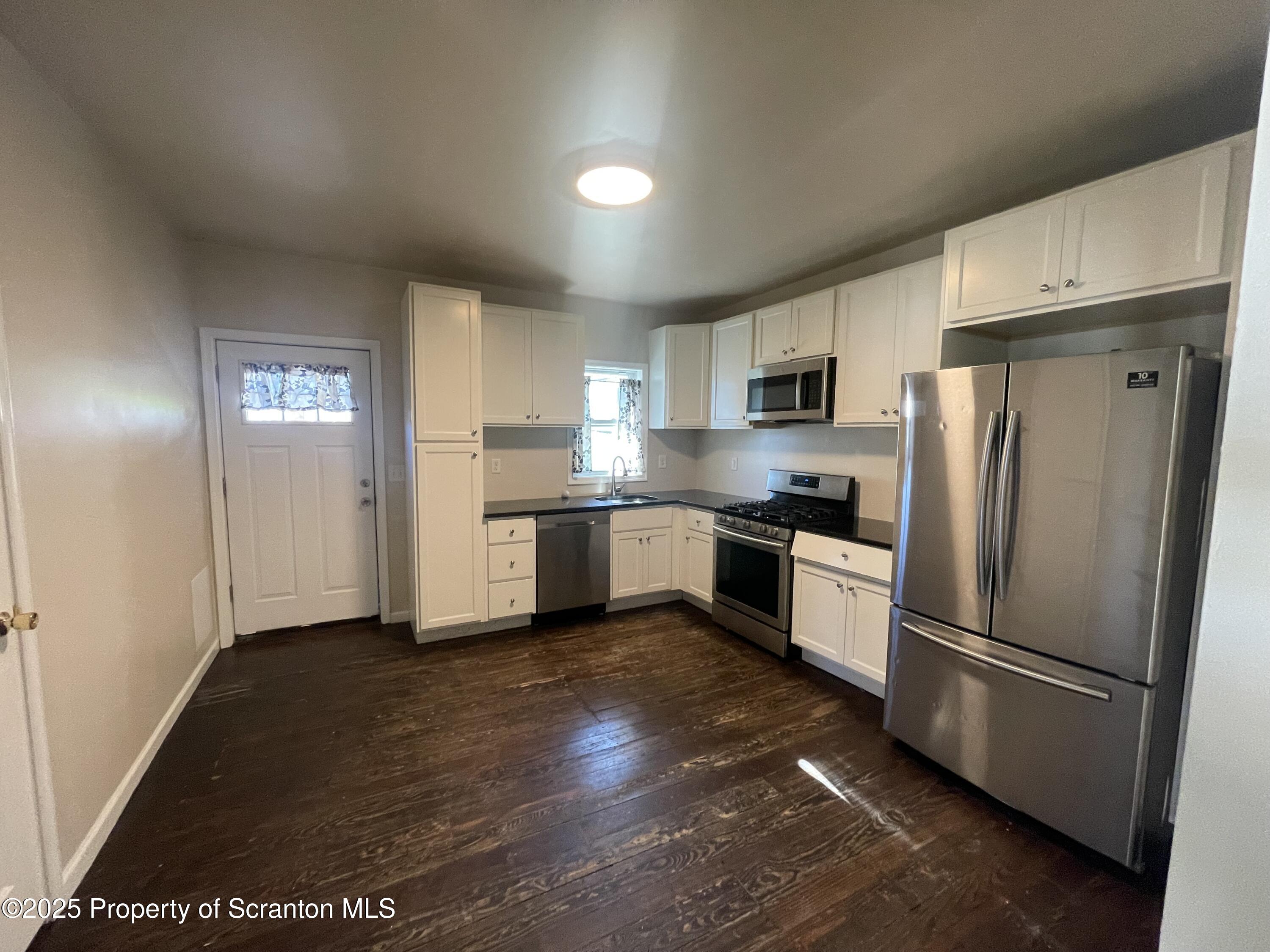 127 West Line Street, Unit DOWNSTAIRS Olyphant, PA 18447 - Photo 3 of 10 IMG_7244