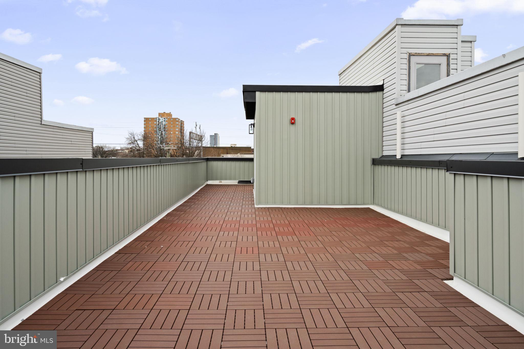 1413 North 8th Street Philadelphia, PA 19122 - Photo 42 of 44 a view of a terrace with wooden floor