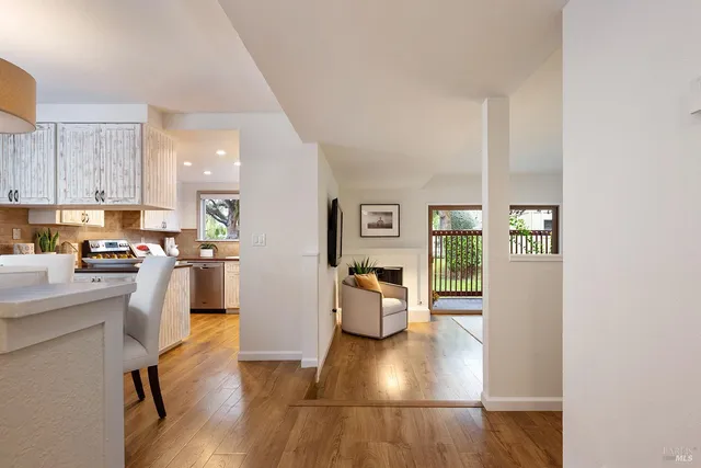 a kitchen with a table and chairs