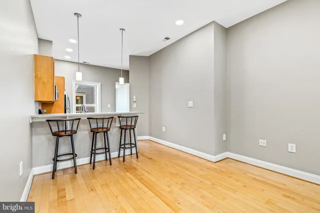 a bathroom with a sink a mirror and a shower