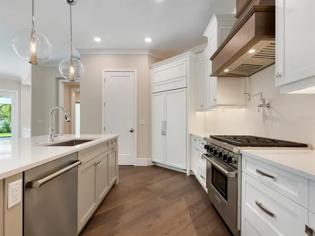 a bathroom with a sink vanity and mirror