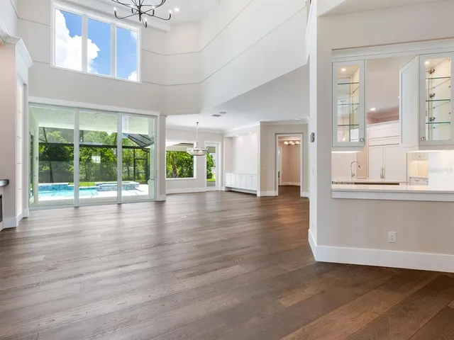 a kitchen with stainless steel appliances a stove a sink and a refrigerator
