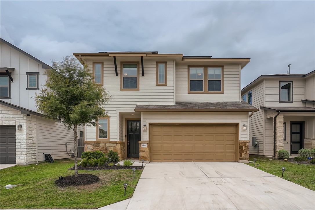 a front view of house with yard