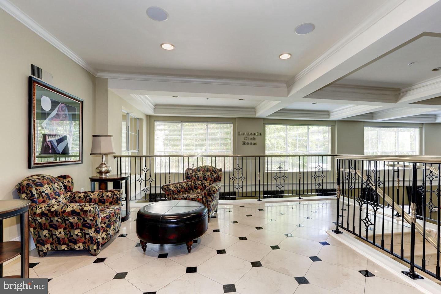 11800 Old Georgetown Road, Unit 1206 Rockville, MD 20852 - Photo 11 of 27 a living room with furniture and a large window