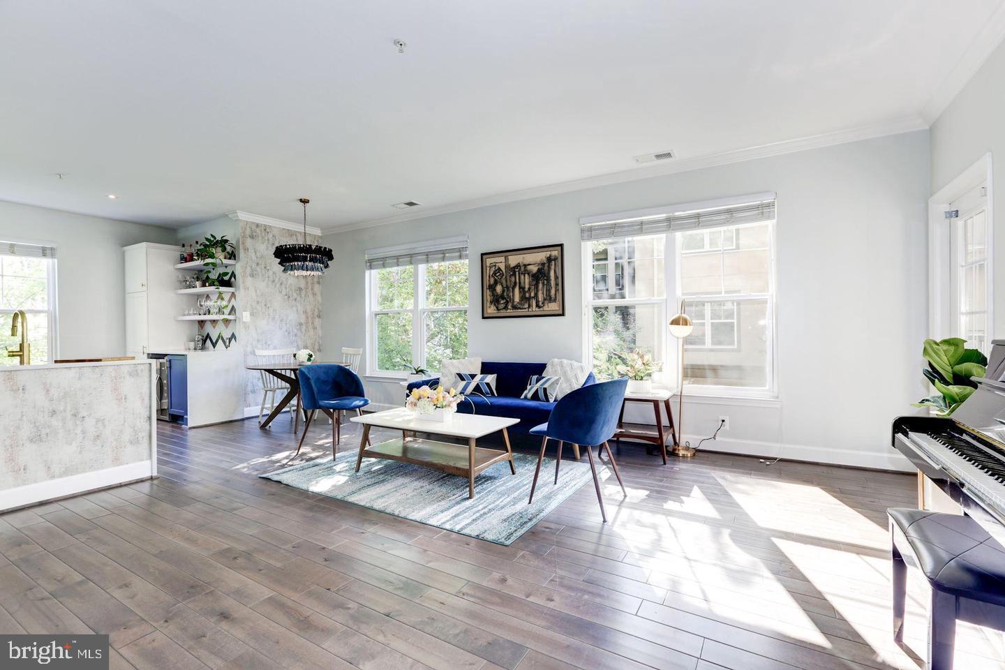 11800 Old Georgetown Road, Unit 1206 Rockville, MD 20852 - Photo 14 of 27 a living room with furniture window and wooden floor
