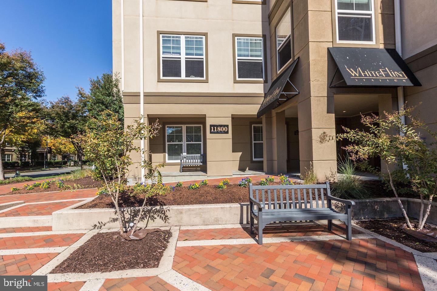 11800 Old Georgetown Road, Unit 1206 Rockville, MD 20852 - Photo 4 of 27 a view of a chair and tables in the patio