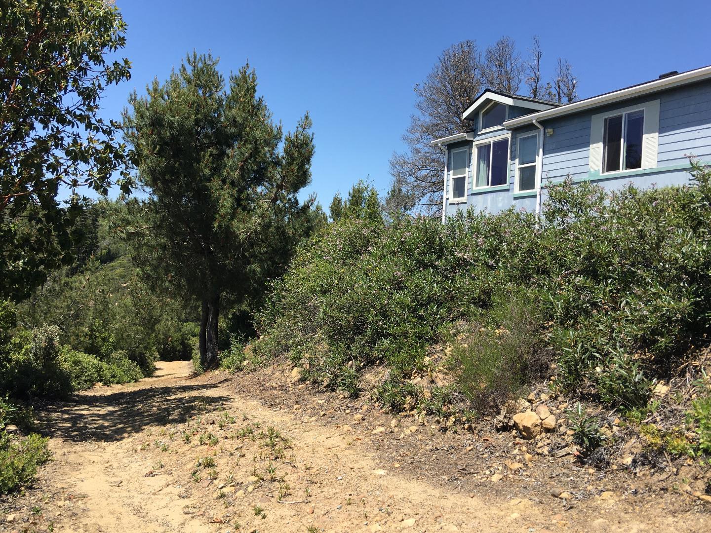 580 Russell Ridge Watsonville, CA 95076 - Photo 12 of 50 a front view of a house with a yard