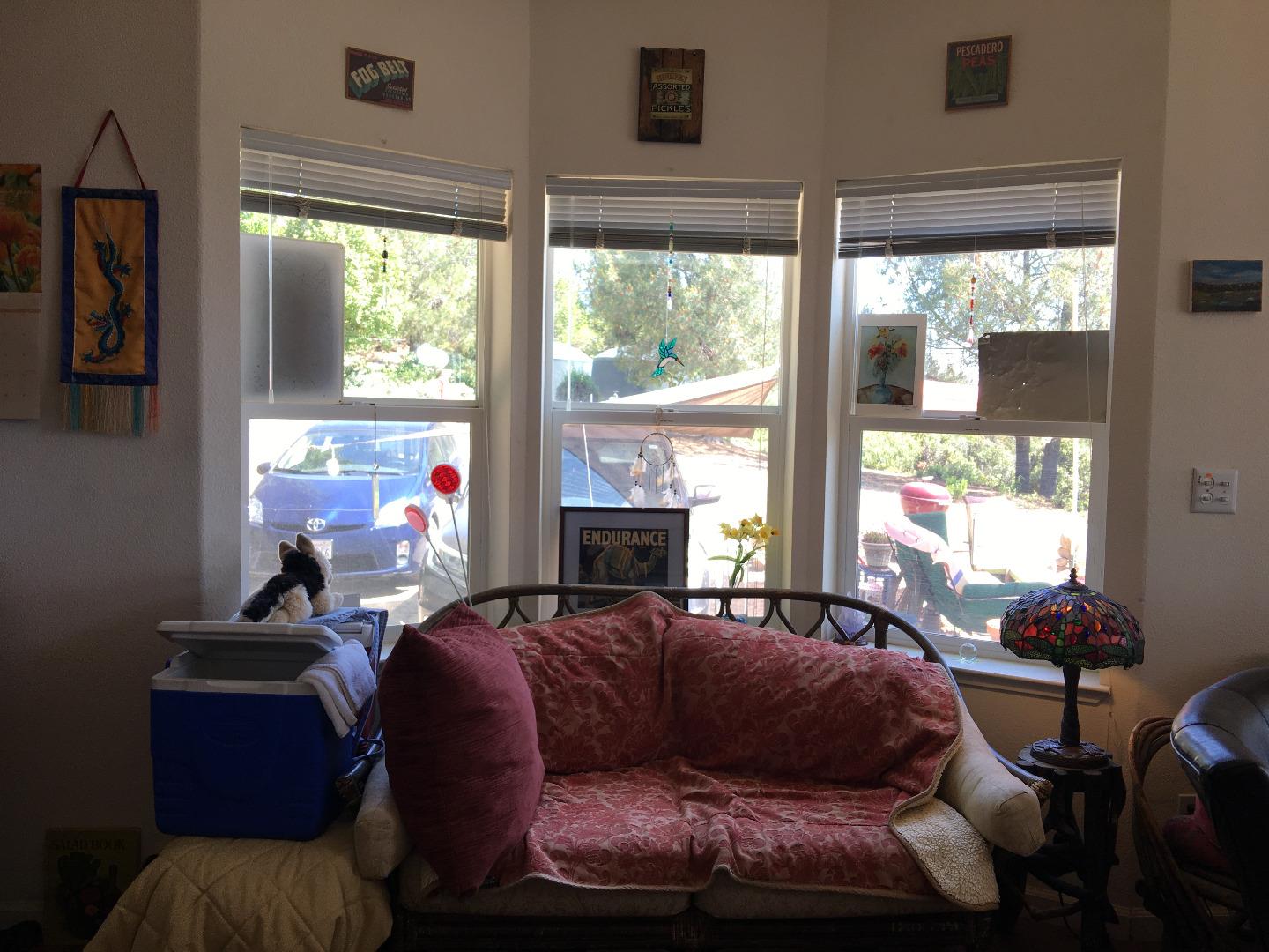 580 Russell Ridge Watsonville, CA 95076 - Photo 28 of 50 a living room with furniture fireplace and a large window