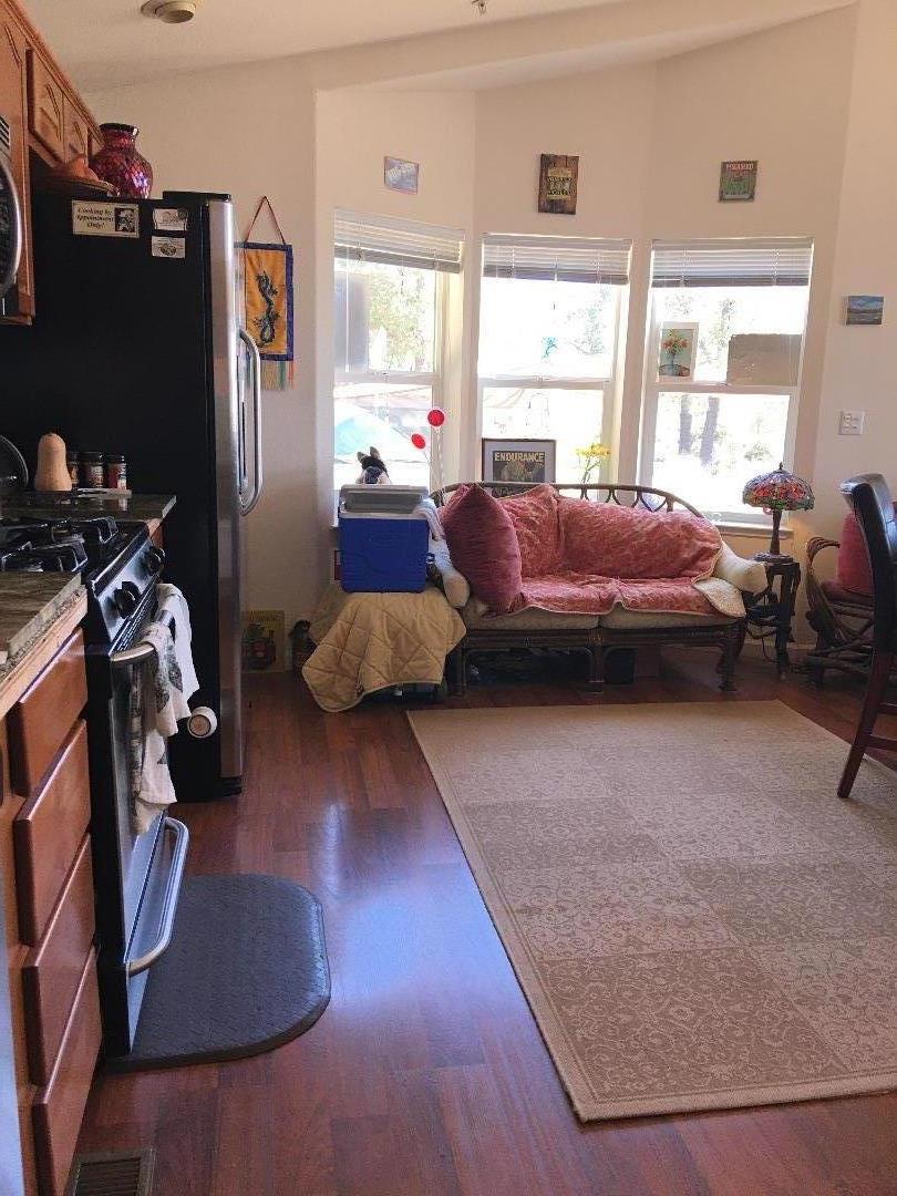 580 Russell Ridge Watsonville, CA 95076 - Photo 32 of 50 a bedroom with furniture and a window