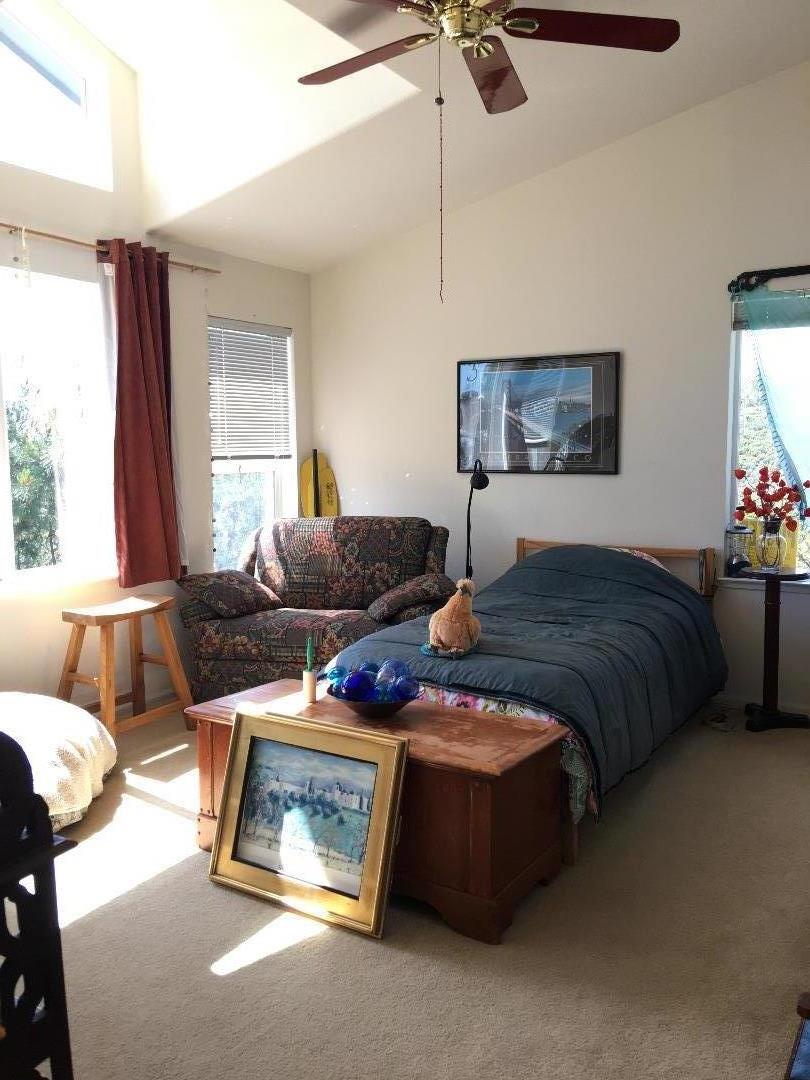 580 Russell Ridge Watsonville, CA 95076 - Photo 35 of 50 a bedroom with a bed and window