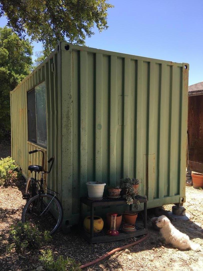 580 Russell Ridge Watsonville, CA 95076 - Photo 45 of 50 a view of a back yard of the house and a chair