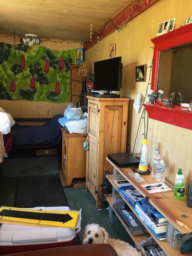 580 Russell Ridge Watsonville, CA 95076 - Photo 48 of 50 a living room with furniture and a flat screen tv