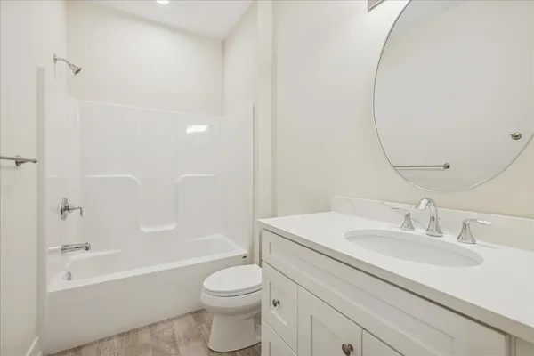 a bathroom with a sink toilet and a bathtub
