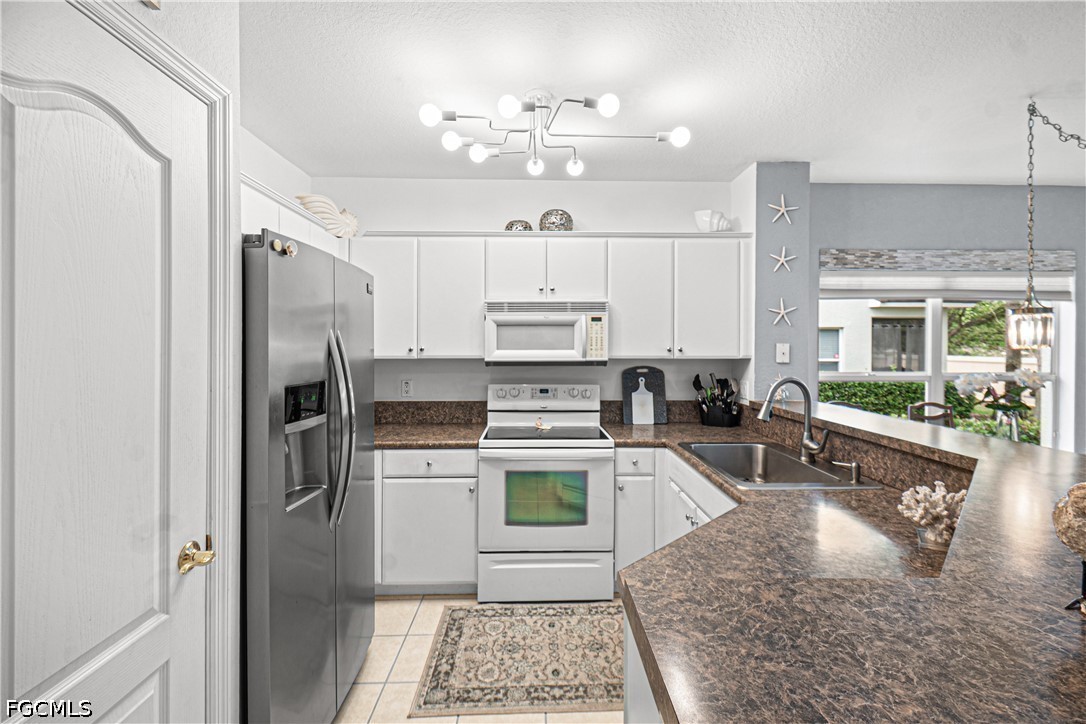8657 Athena Court Lehigh Acres, FL 33971 - Photo 3 of 21