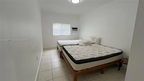 a room with a table and window