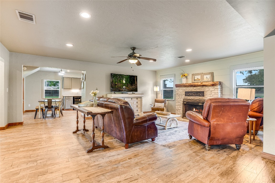 2308 Flite Acres Road Wimberley, TX 78676 - Photo 7 of 35 a living room with furniture and a flat screen tv