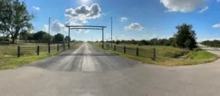 a view of a lake from a yard