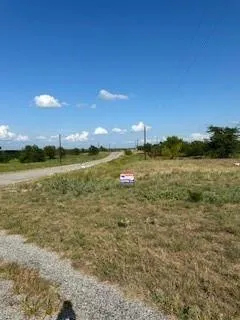 a view of a houses with a yard