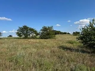 a view of a lake with outdoor space