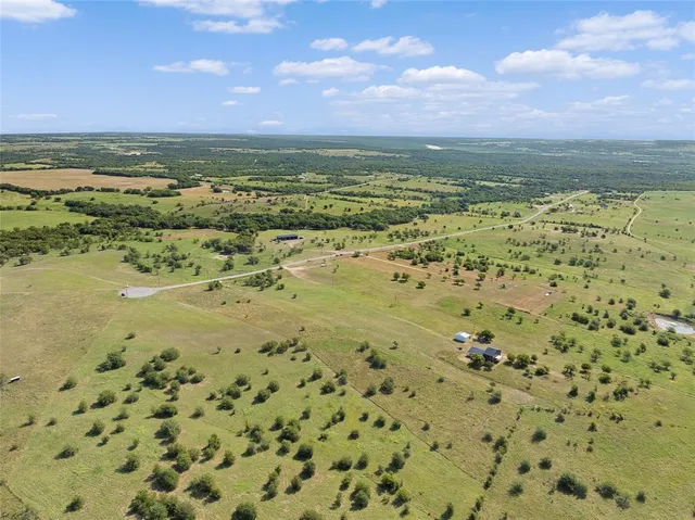 a view of a city with an ocean