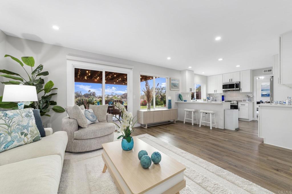 460 Compass Road Oceanside, CA 92054 - Photo 17 of 45 a living room with furniture kitchen and a table