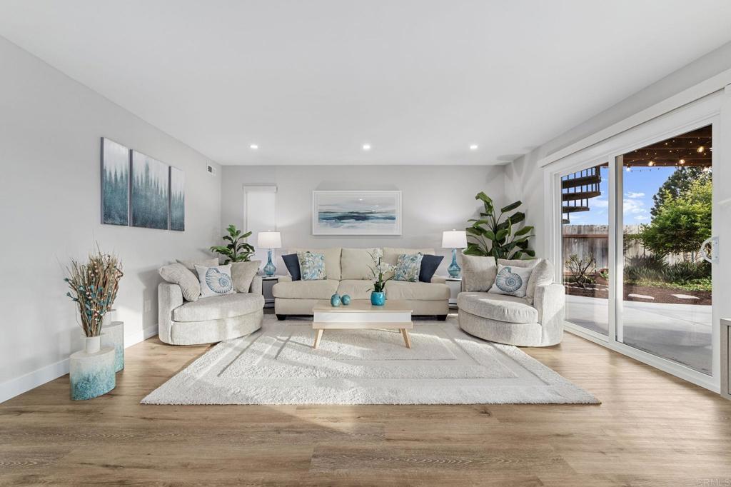 460 Compass Road Oceanside, CA 92054 - Photo 18 of 45 a living room with furniture and a large window