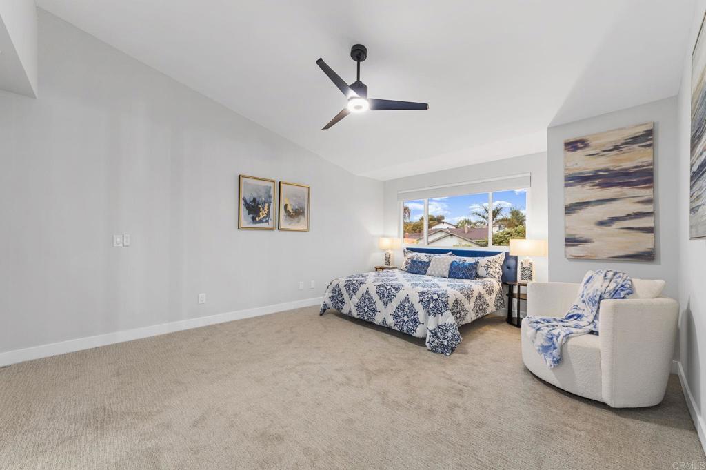 460 Compass Road Oceanside, CA 92054 - Photo 26 of 45 a bedroom with a bed and a couch