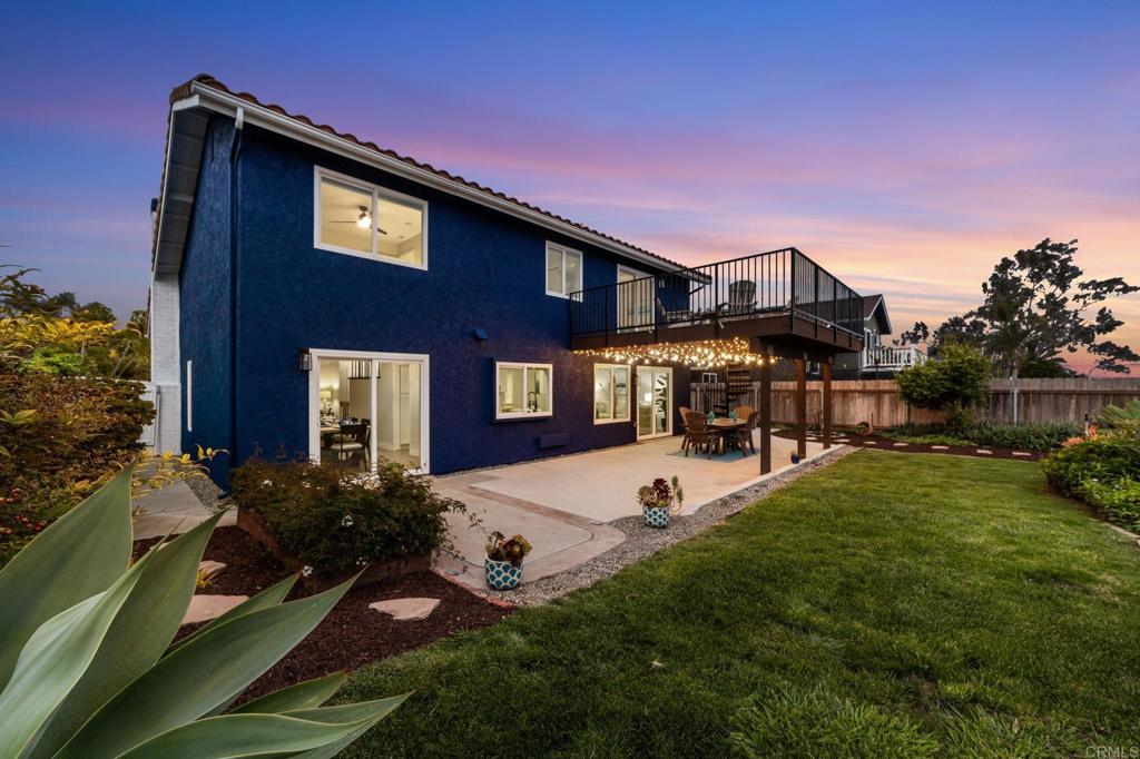 460 Compass Road Oceanside, CA 92054 - Photo 3 of 45 a view of a house with a yard patio and fire pit