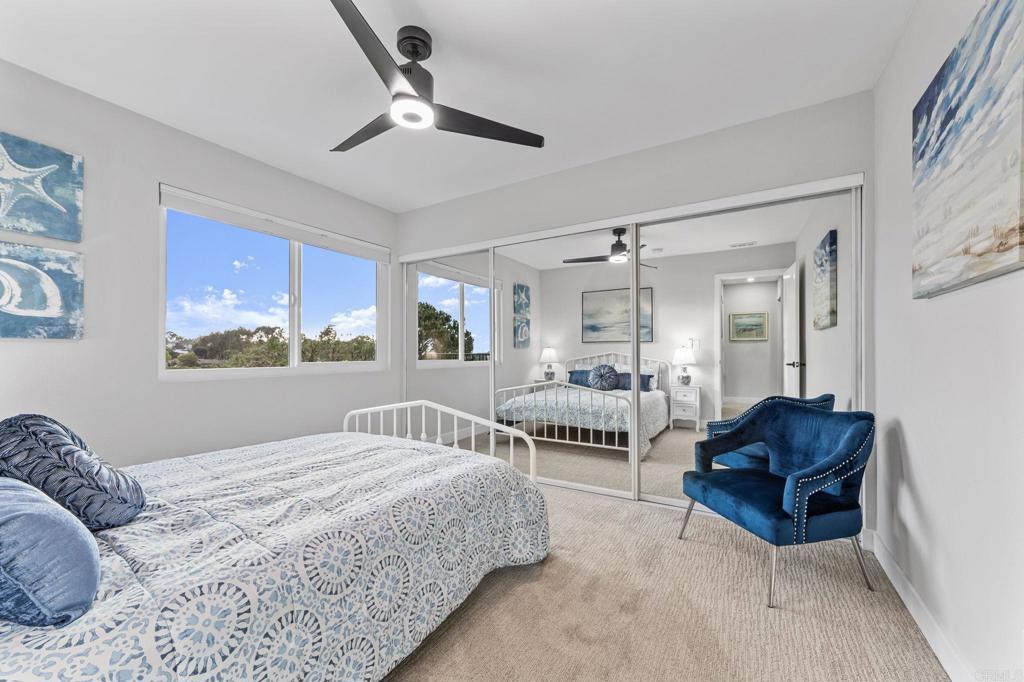 460 Compass Road Oceanside, CA 92054 - Photo 31 of 45 a bedroom with a bed and window