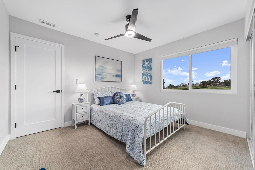460 Compass Road Oceanside, CA 92054 - Photo 32 of 45 a bedroom with a bed and window