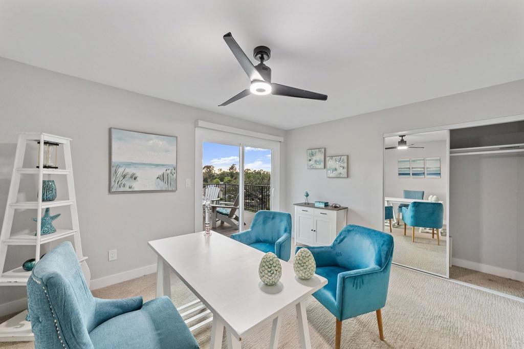 460 Compass Road Oceanside, CA 92054 - Photo 37 of 45 a living room with furniture and a table