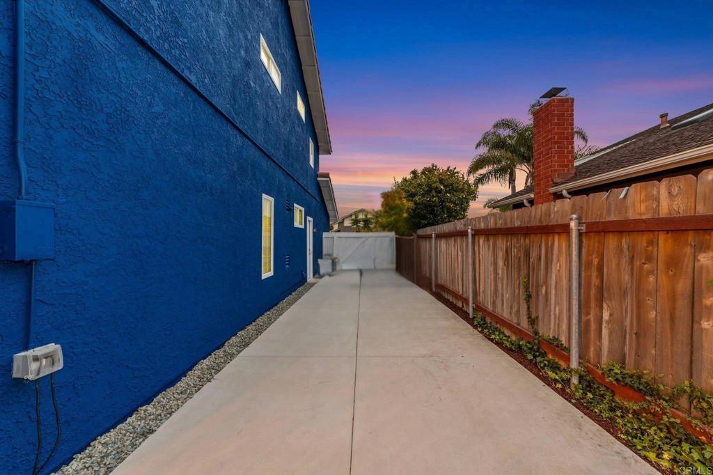 460 Compass Road Oceanside, CA 92054 - Photo 41 of 45 a view of a wooden fence and a pathway