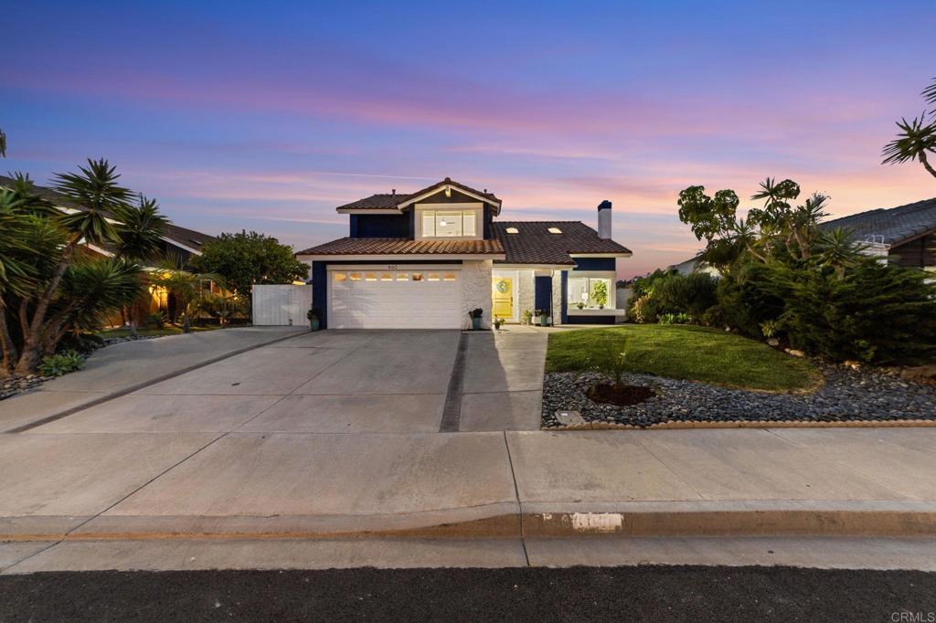 460 Compass Road Oceanside, CA 92054 - Photo 43 of 45 a front view of a house with a yard